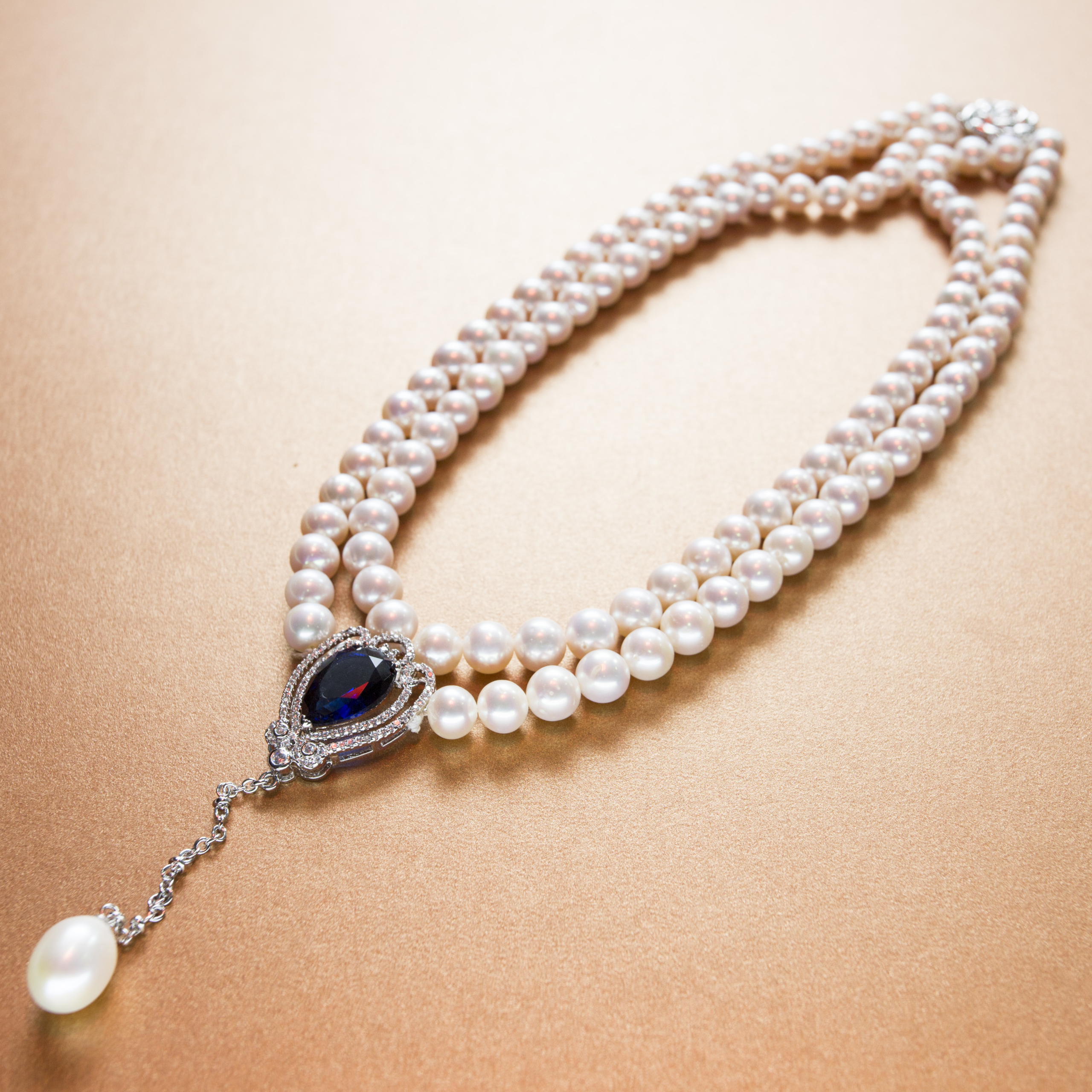 Royal Queen diamond shaped Sapphire stone single hanging pearl double strand white pearl necklace- with silver floral clasp